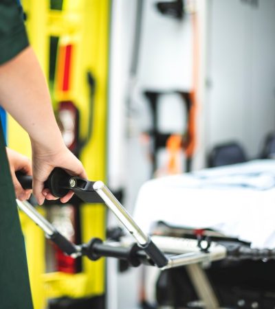 paramedics-work-with-ambulance_53876-144801